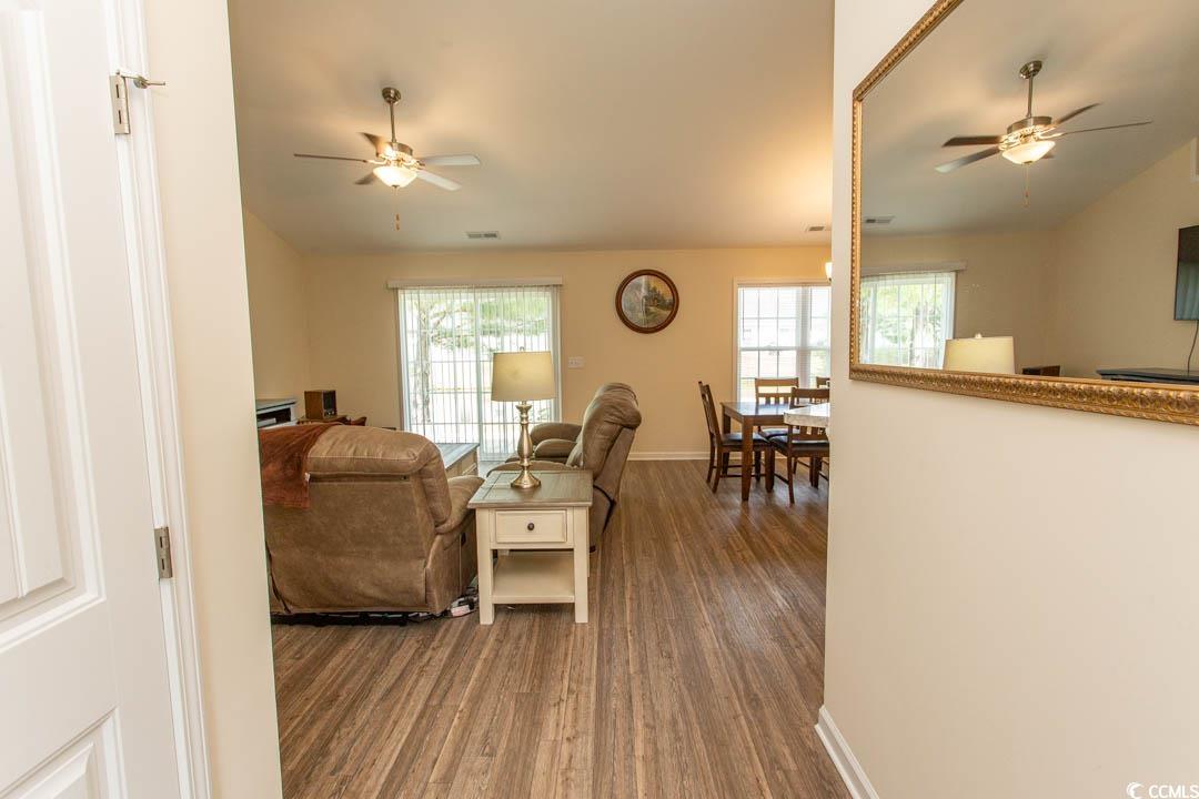 125 St Barnabus Road Loris, SC 29569 - Photo 7 of 39 Living room with hardwood / wood-style floors, cei