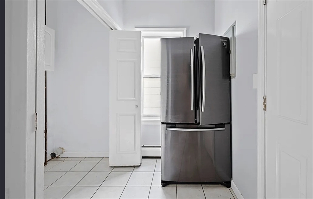 61 Shurtleff Street, Unit 4 Chelsea, MA 02150 - Photo 5 of 22 a view of a refrigerator in kitchen