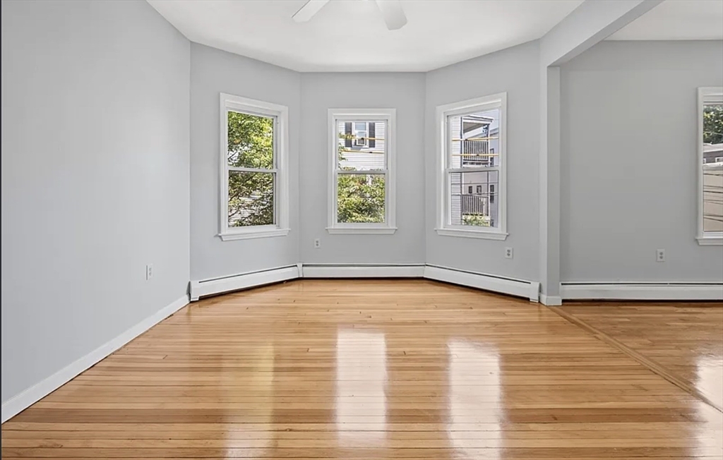 61 Shurtleff Street, Unit 4 Chelsea, MA 02150 - Photo 9 of 22 an empty room with window