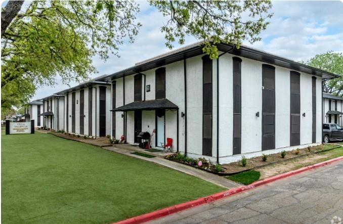 313 Rolston Road, Unit 301103 Irving, TX 75060 - Photo 14 of 15 a view of a house with backyard and porch