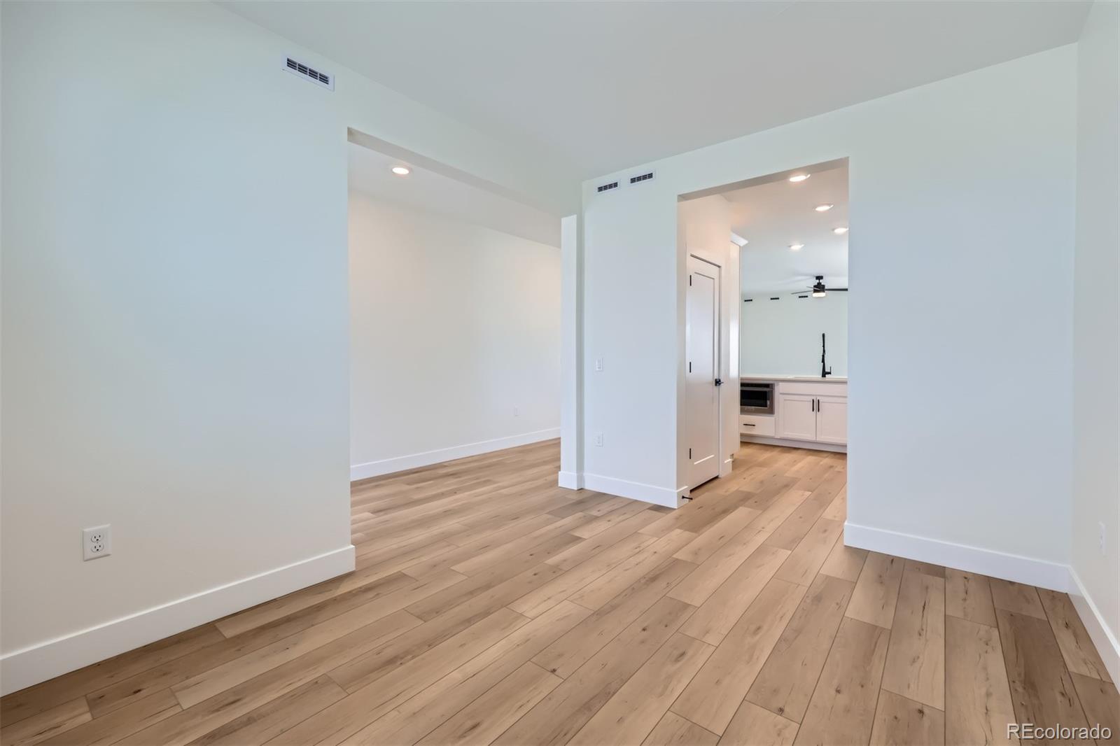42982 Colonial Trail Elizabeth, CO 80107 - Photo 12 of 31 a view of empty room with wooden floor
