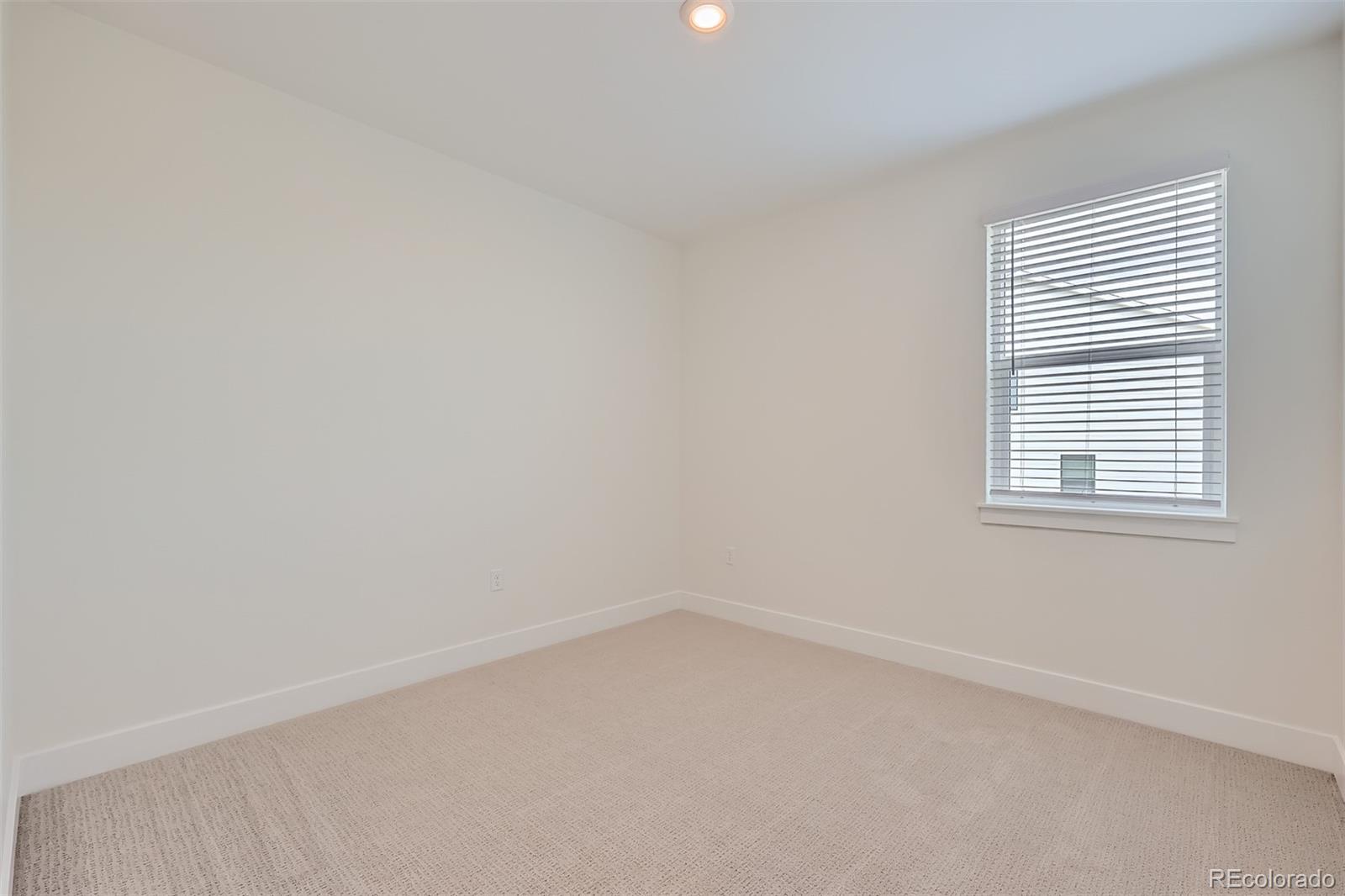 42982 Colonial Trail Elizabeth, CO 80107 - Photo 22 of 31 an empty room with a window