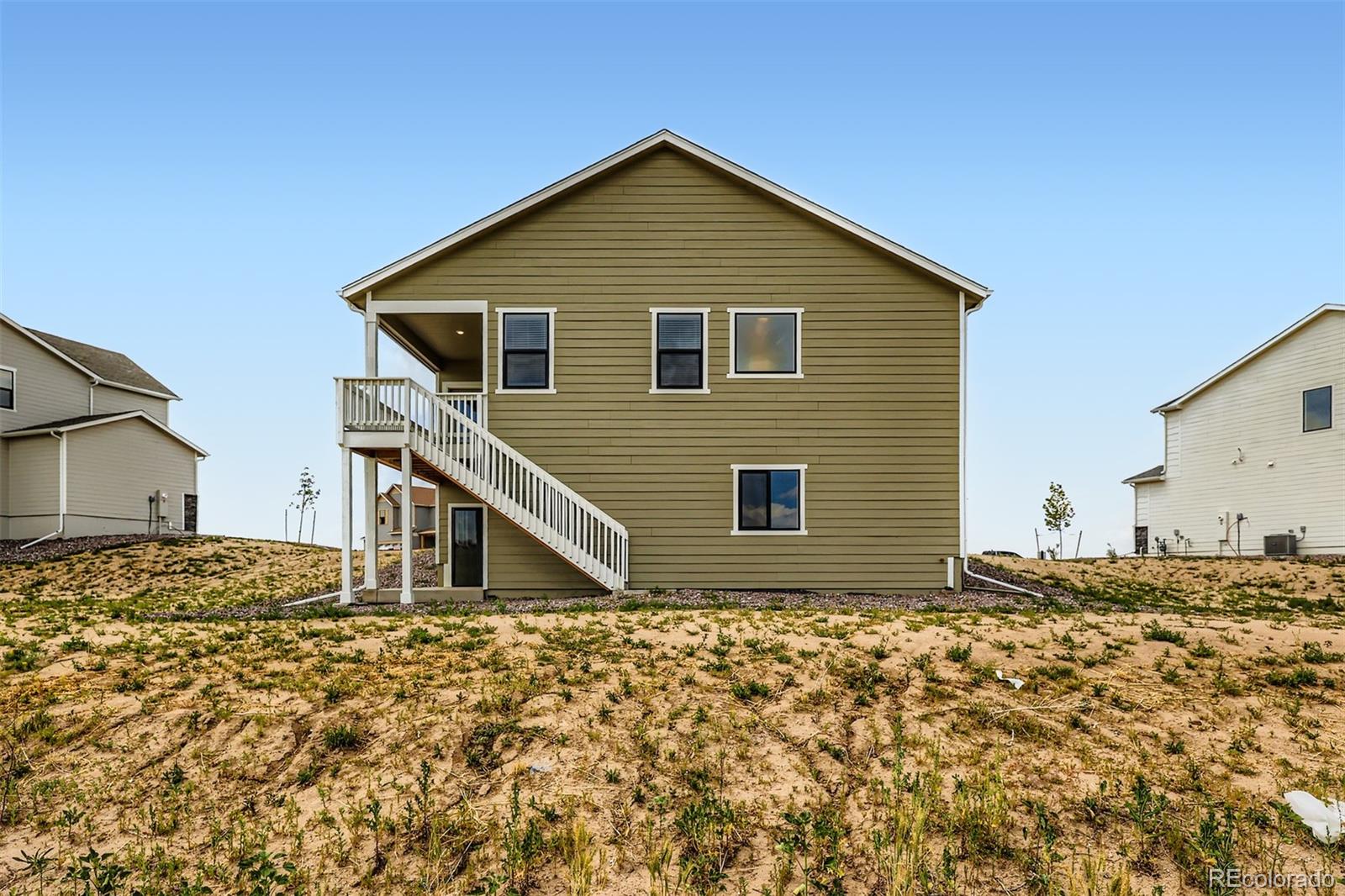 42982 Colonial Trail Elizabeth, CO 80107 - Photo 5 of 31 a view of a backyard of a house