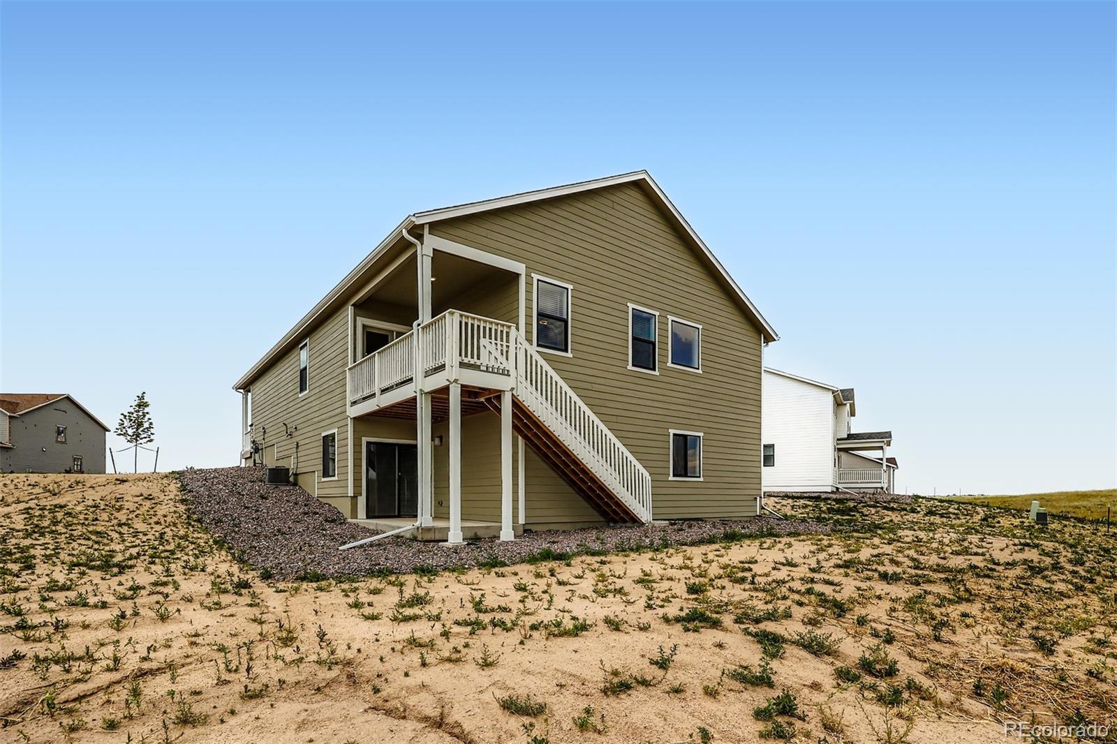 42982 Colonial Trail Elizabeth, CO 80107 - Photo 6 of 31 a very nice looking house with a large window