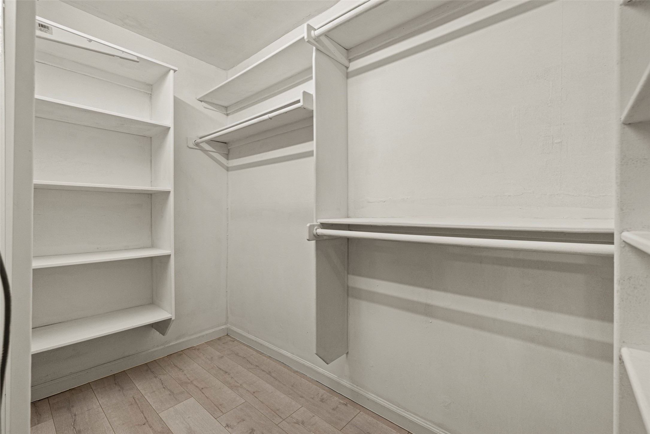 2927 Rockyridge Drive Houston, TX 77063 - Photo 27 of 34 a view of an empty walk in closet