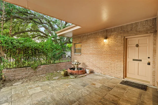 a backyard of a house with seating space
