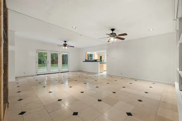 a view of a kitchen with a sink and a stove top oven