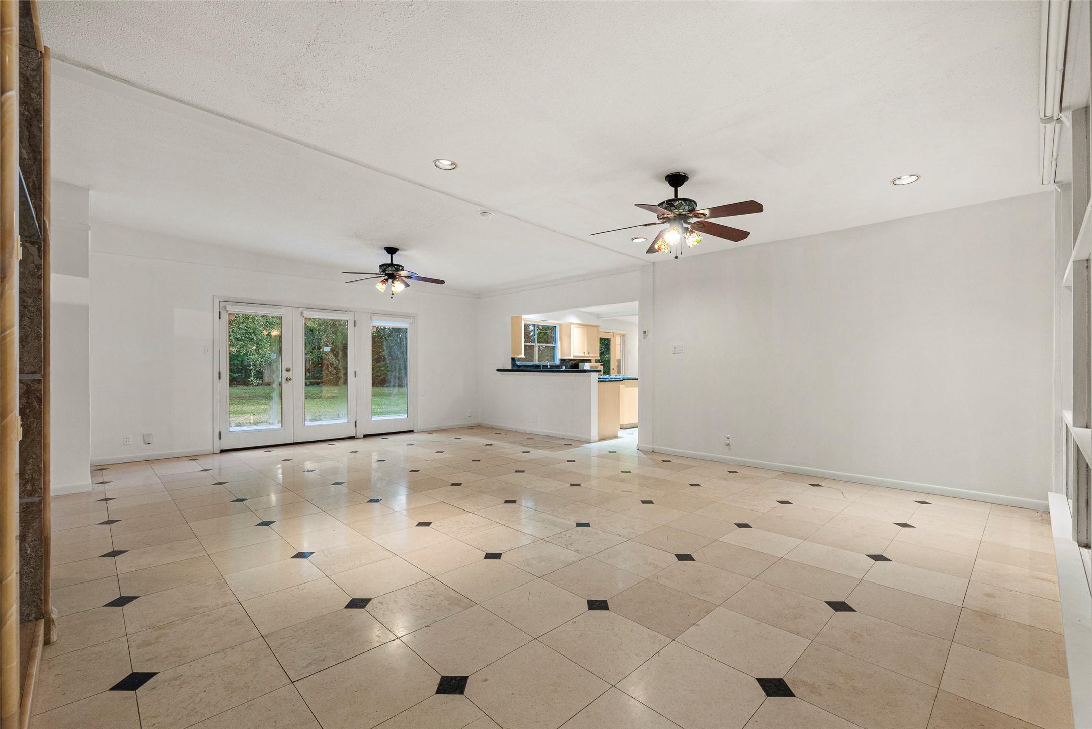 2927 Rockyridge Drive Houston, TX 77063 - Photo 5 of 34 a view of a kitchen with a sink and a stove top oven