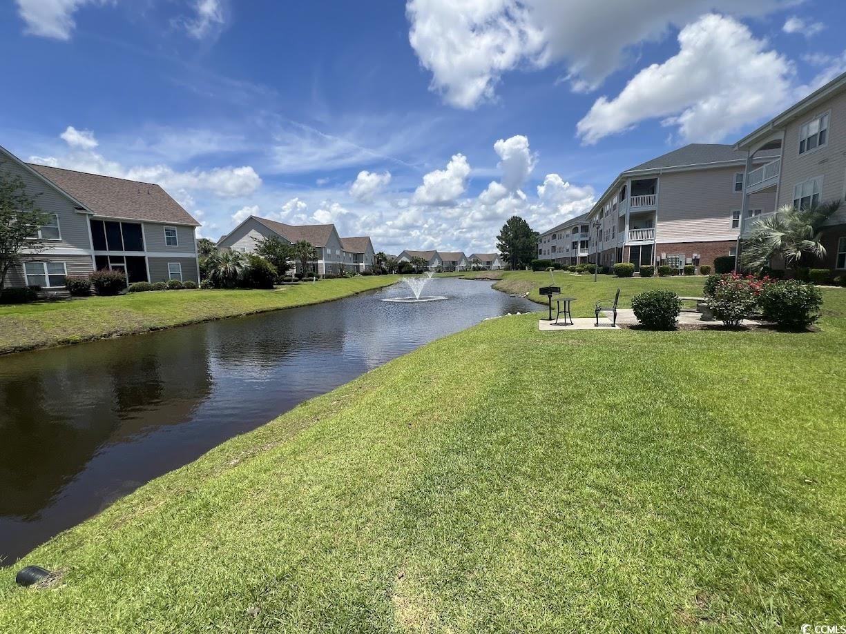 3965 Forsythia Court, Unit 202 Myrtle Beach, SC 29588 - Photo 14 of 15 Water view with nearby suburban area