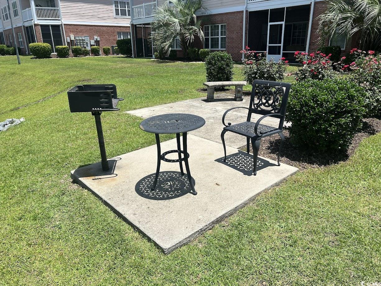 3965 Forsythia Court, Unit 202 Myrtle Beach, SC 29588 - Photo 15 of 15 View of patio / terrace