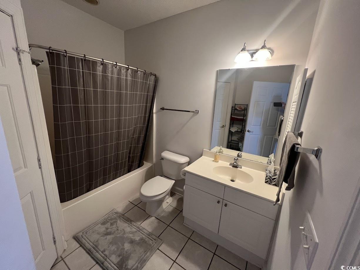 3965 Forsythia Court, Unit 202 Myrtle Beach, SC 29588 - Photo 8 of 15 Full bath with vanity, tile patterned flooring, and shower / tub combo