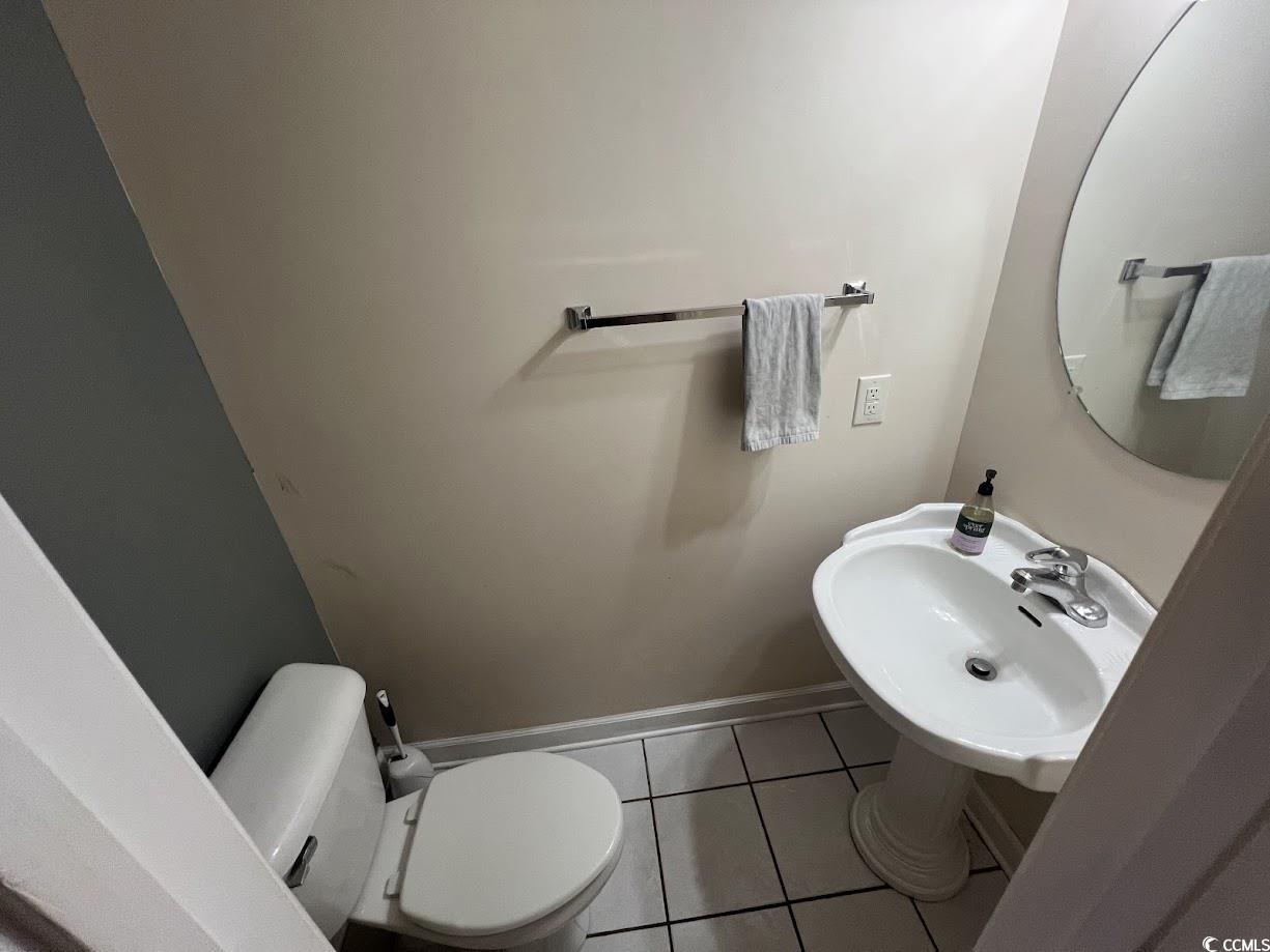 3965 Forsythia Court, Unit 202 Myrtle Beach, SC 29588 - Photo 10 of 15 Bathroom featuring tile patterned floors and baseboards
