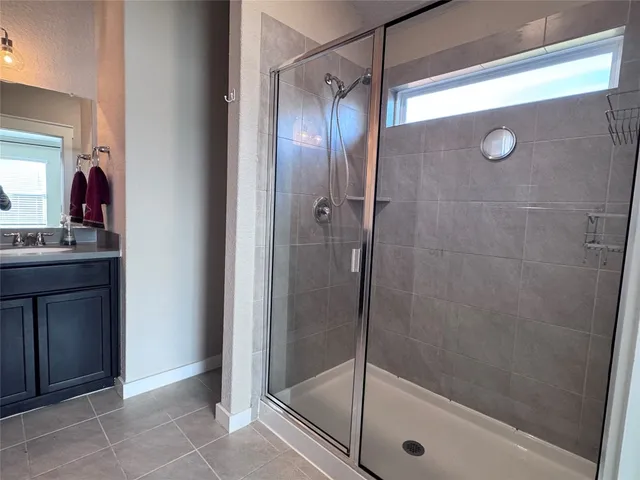 a view of storage and utility room with washer and dryer