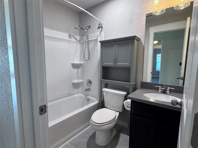 a house with yard in front of it