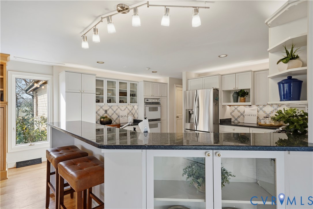 805 Rockford Road Manakin-Sabot, VA 23103 - Photo 14 of 46 a kitchen with refrigerator and window