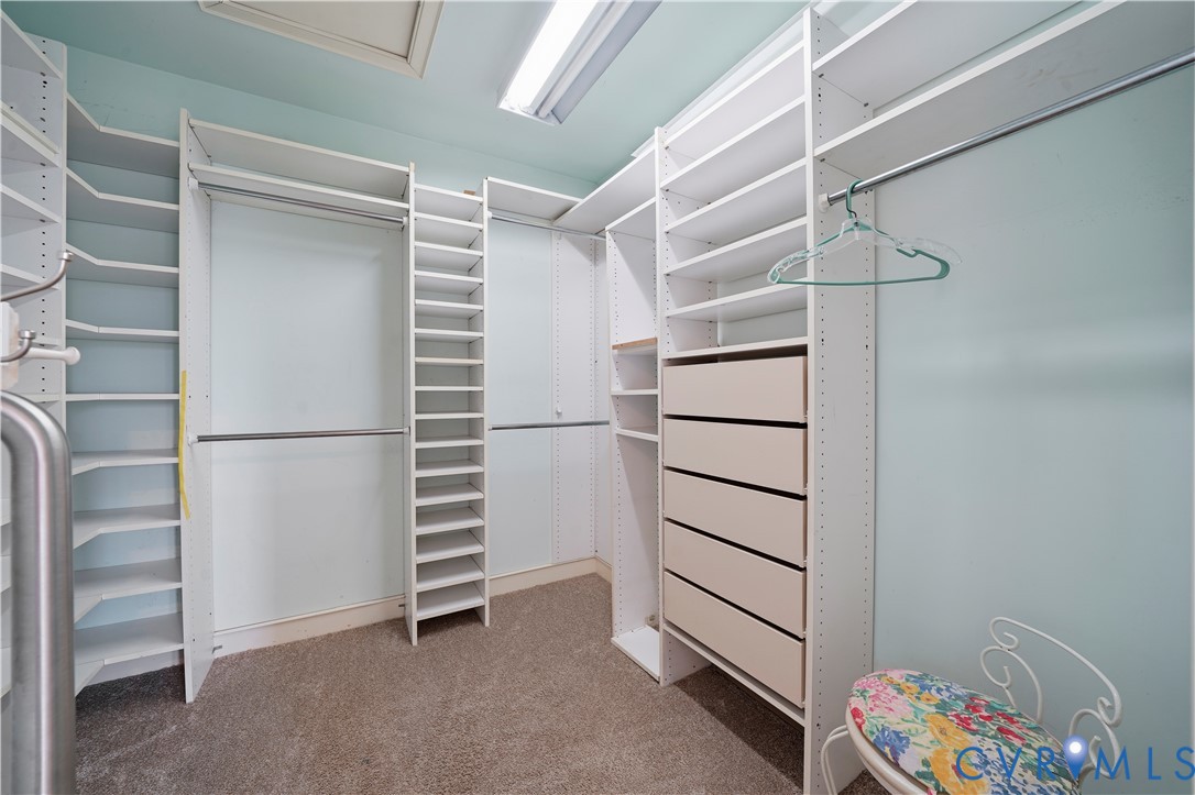 805 Rockford Road Manakin-Sabot, VA 23103 - Photo 29 of 46 a view of walk in closet with empty racks