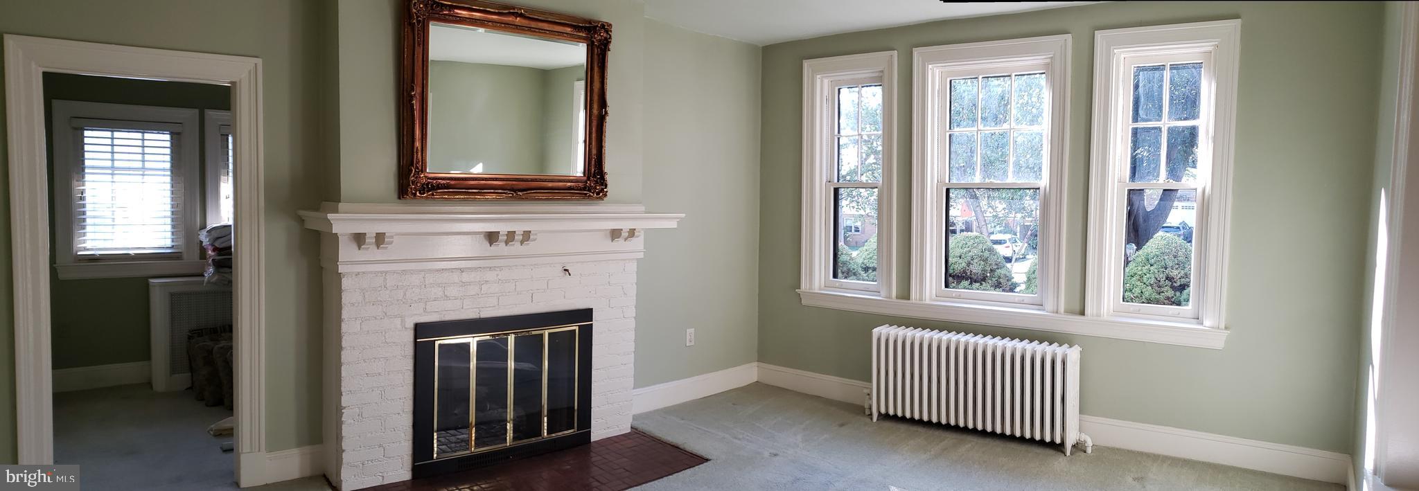 116 Renfrew Avenue Trenton, NJ 08618 - Photo 20 of 36 Living Room, fireplace & access to the Den