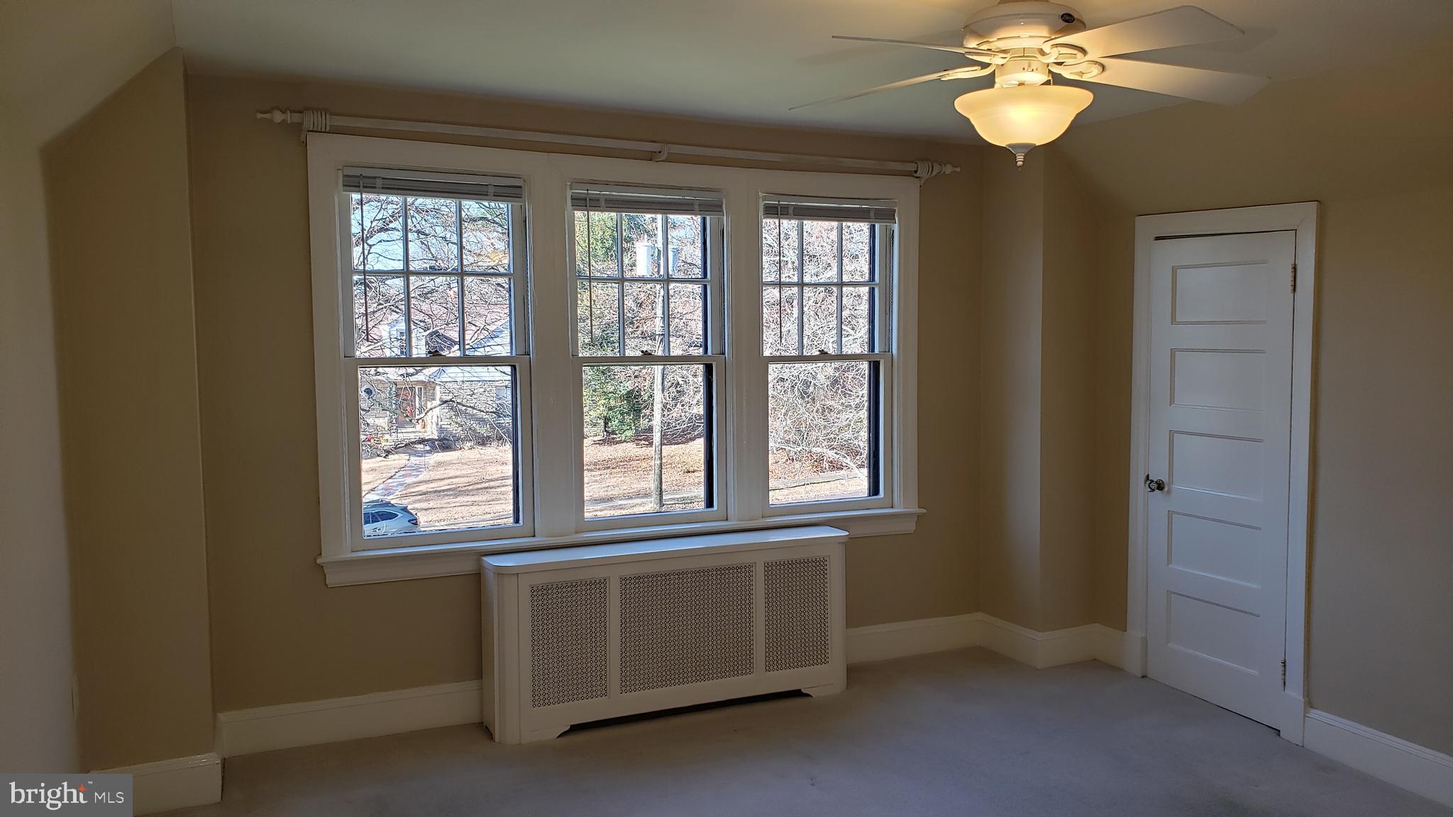 116 Renfrew Avenue Trenton, NJ 08618 - Photo 23 of 36 Primary BR triple windows overlooking front yard