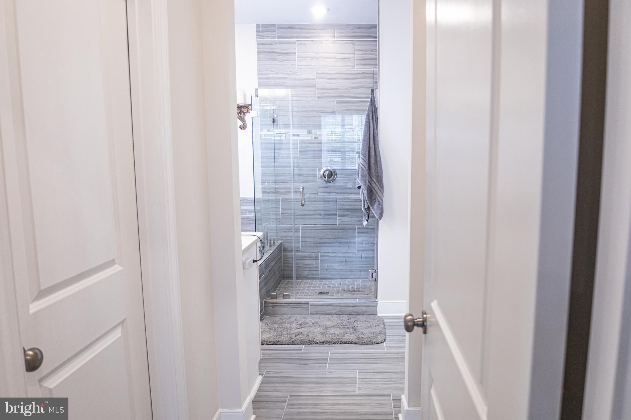 12207 American Chestnut Road Bowie, MD 20720 - Photo 11 of 19 a bathroom with a shower