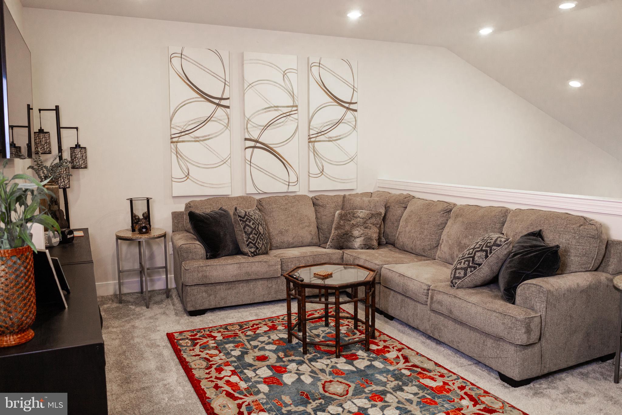 12207 American Chestnut Road Bowie, MD 20720 - Photo 13 of 19 a living room with furniture and a couch