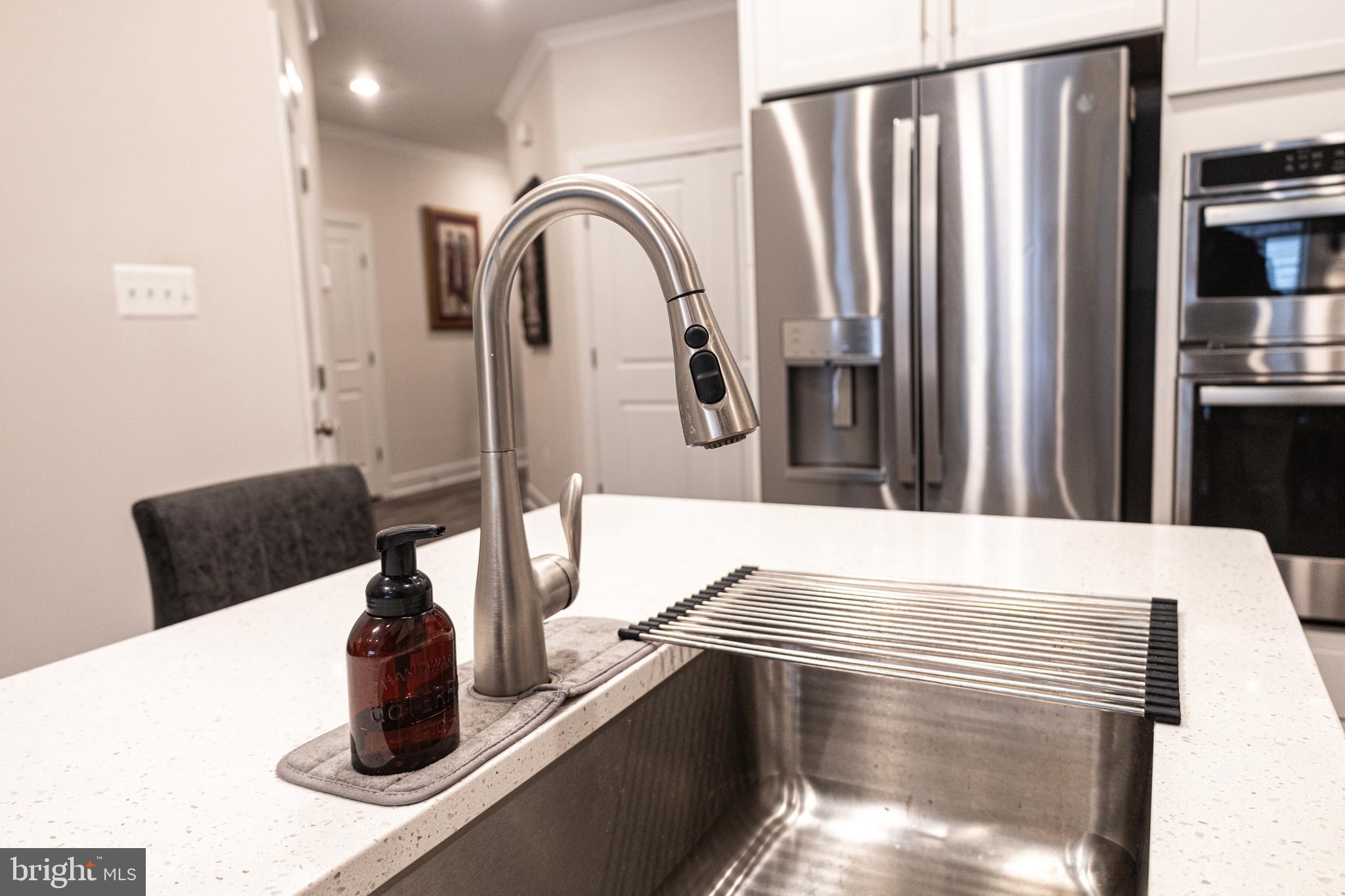 12207 American Chestnut Road Bowie, MD 20720 - Photo 6 of 19 a close view of dining table
