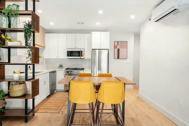 a view of balcony with furniture