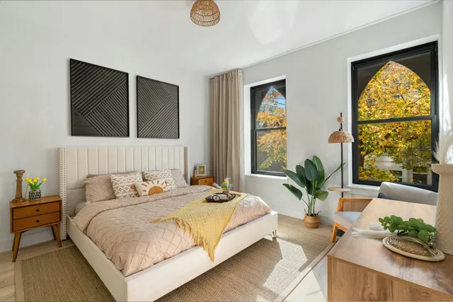 a kitchen with stainless steel appliances a refrigerator and microwave