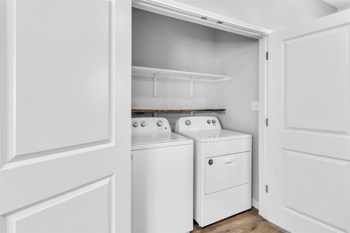 105 Bell Rings Drive Jarrell, TX 76537 - Photo 10 of 22 a utility room with dryer and washer