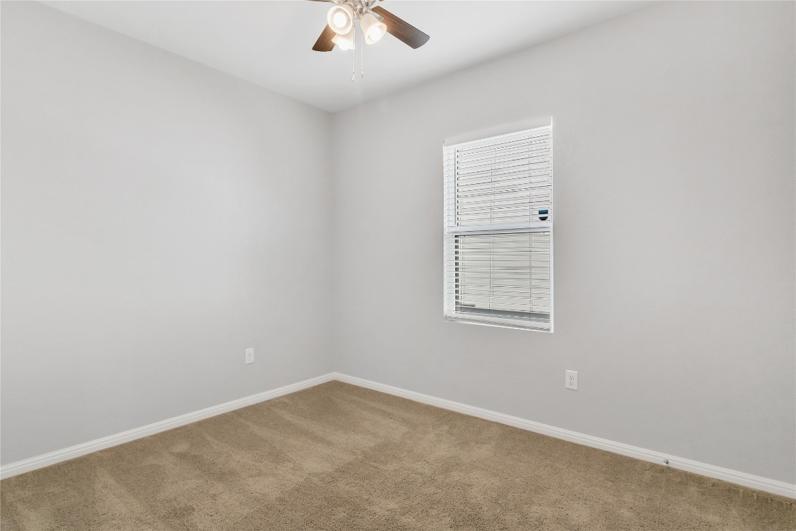 105 Bell Rings Drive Jarrell, TX 76537 - Photo 16 of 22 an empty room with a window