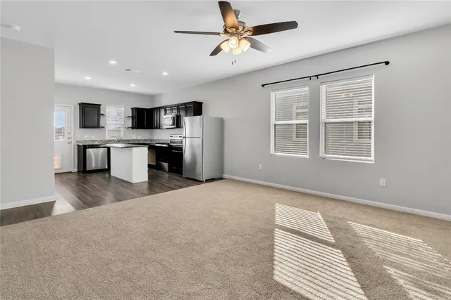 a front view of a house with garage