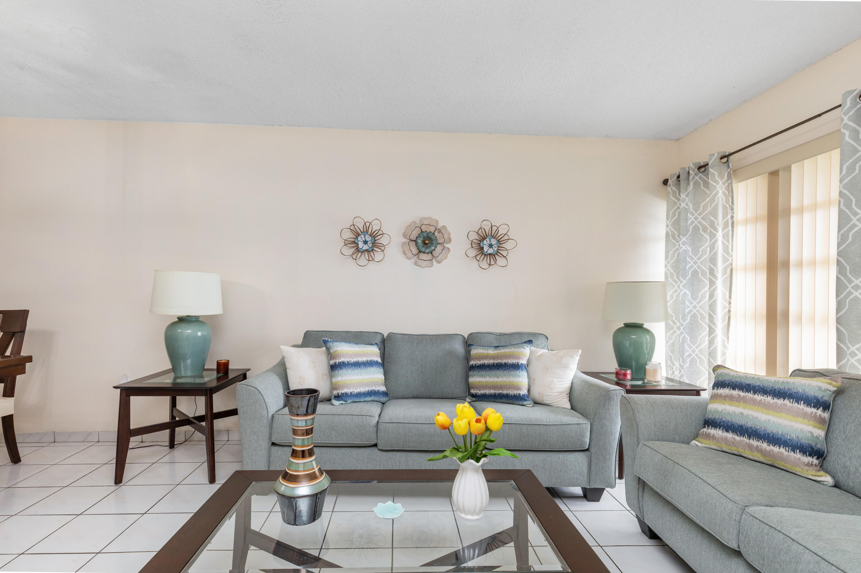 406 Southwest 96th Court, Unit 2 Miami, FL 33174 - Photo 11 of 38 a living room with furniture and a window