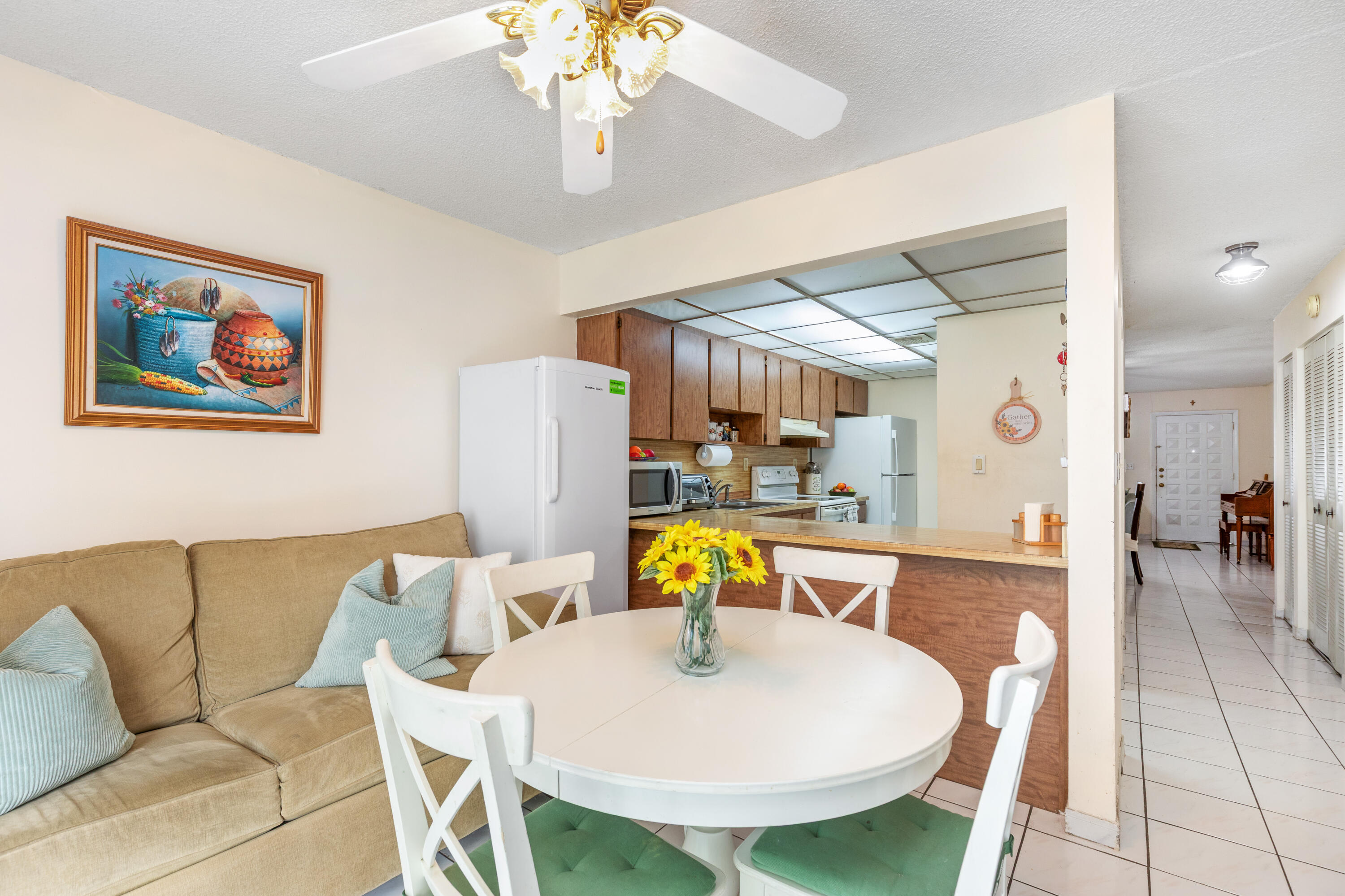 406 Southwest 96th Court, Unit 2 Miami, FL 33174 - Photo 21 of 38 a living room with furniture and a chandelier