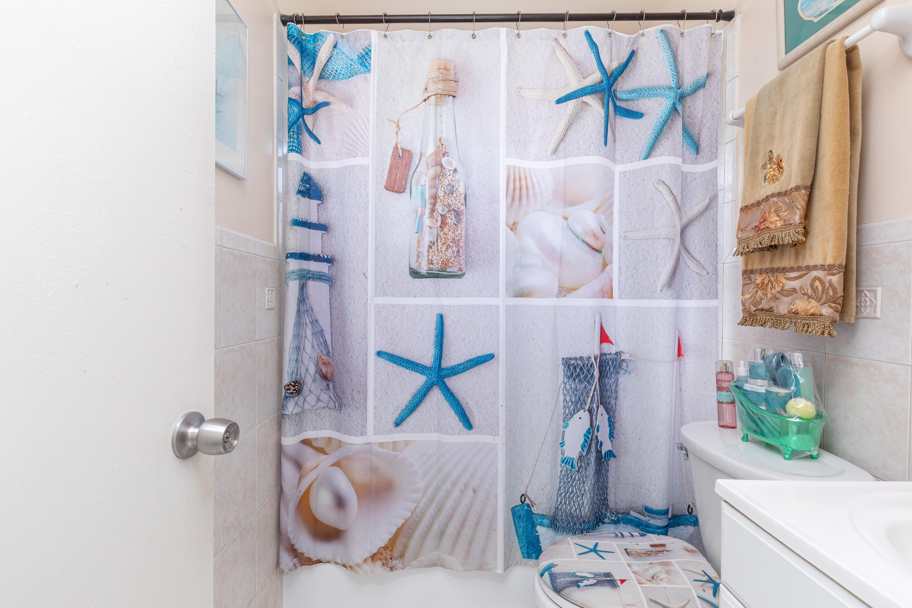 406 Southwest 96th Court, Unit 2 Miami, FL 33174 - Photo 29 of 38 a bathroom with a sink toilet and shower curtain