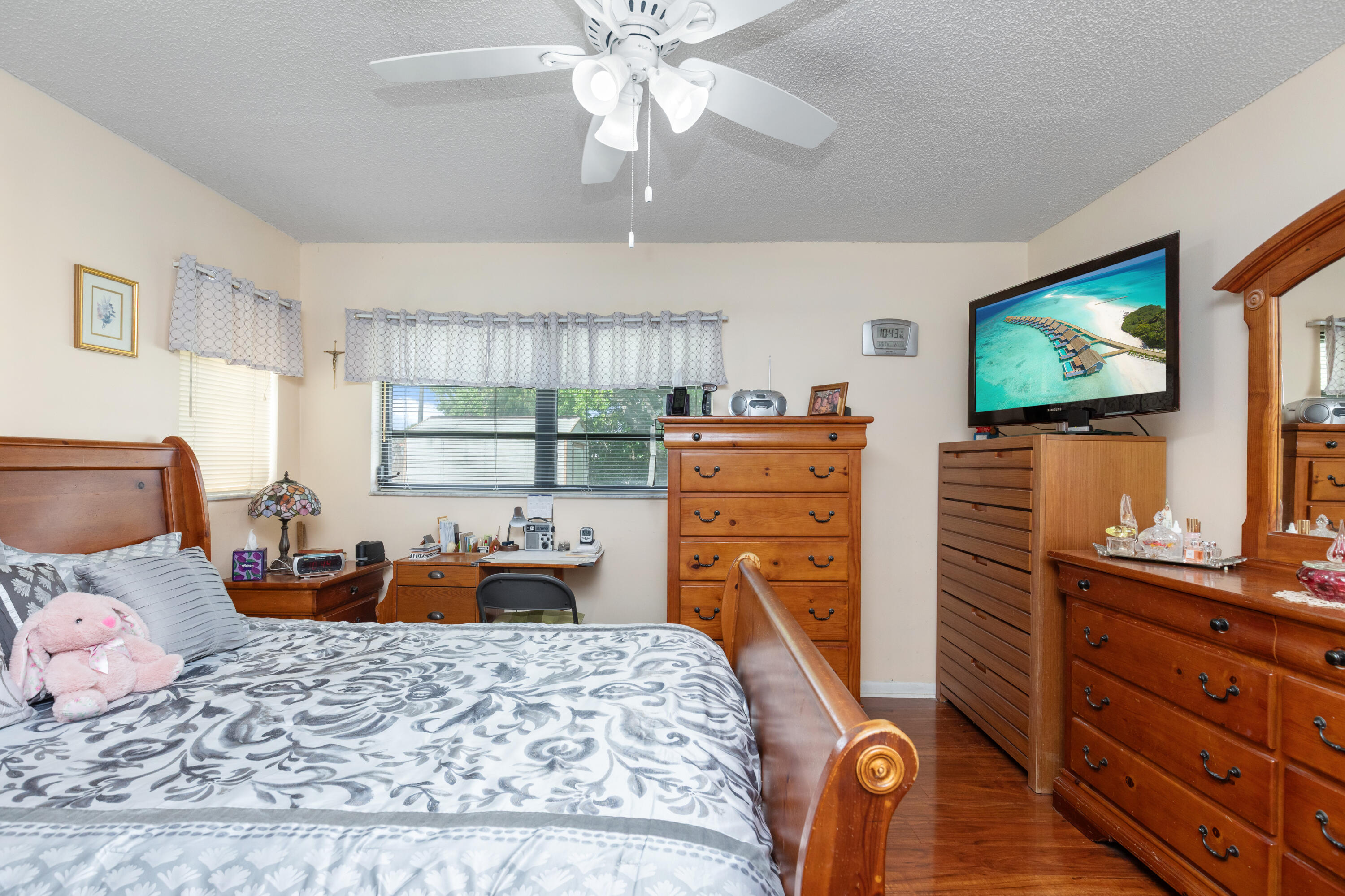 406 Southwest 96th Court, Unit 2 Miami, FL 33174 - Photo 30 of 38 a bedroom with a bed and furniture