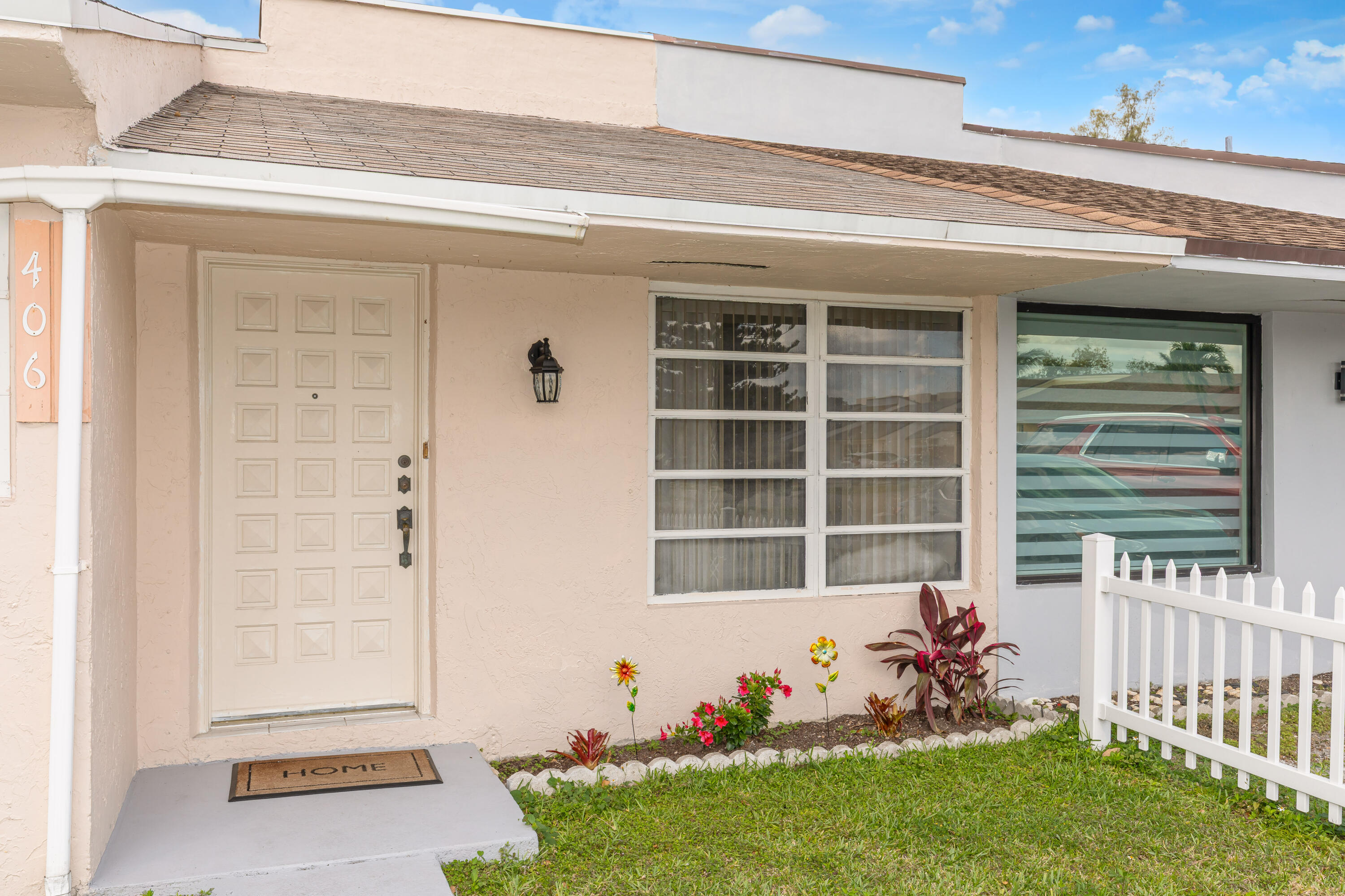 406 Southwest 96th Court, Unit 2 Miami, FL 33174 - Photo 3 of 38 a front view of a house with a yard