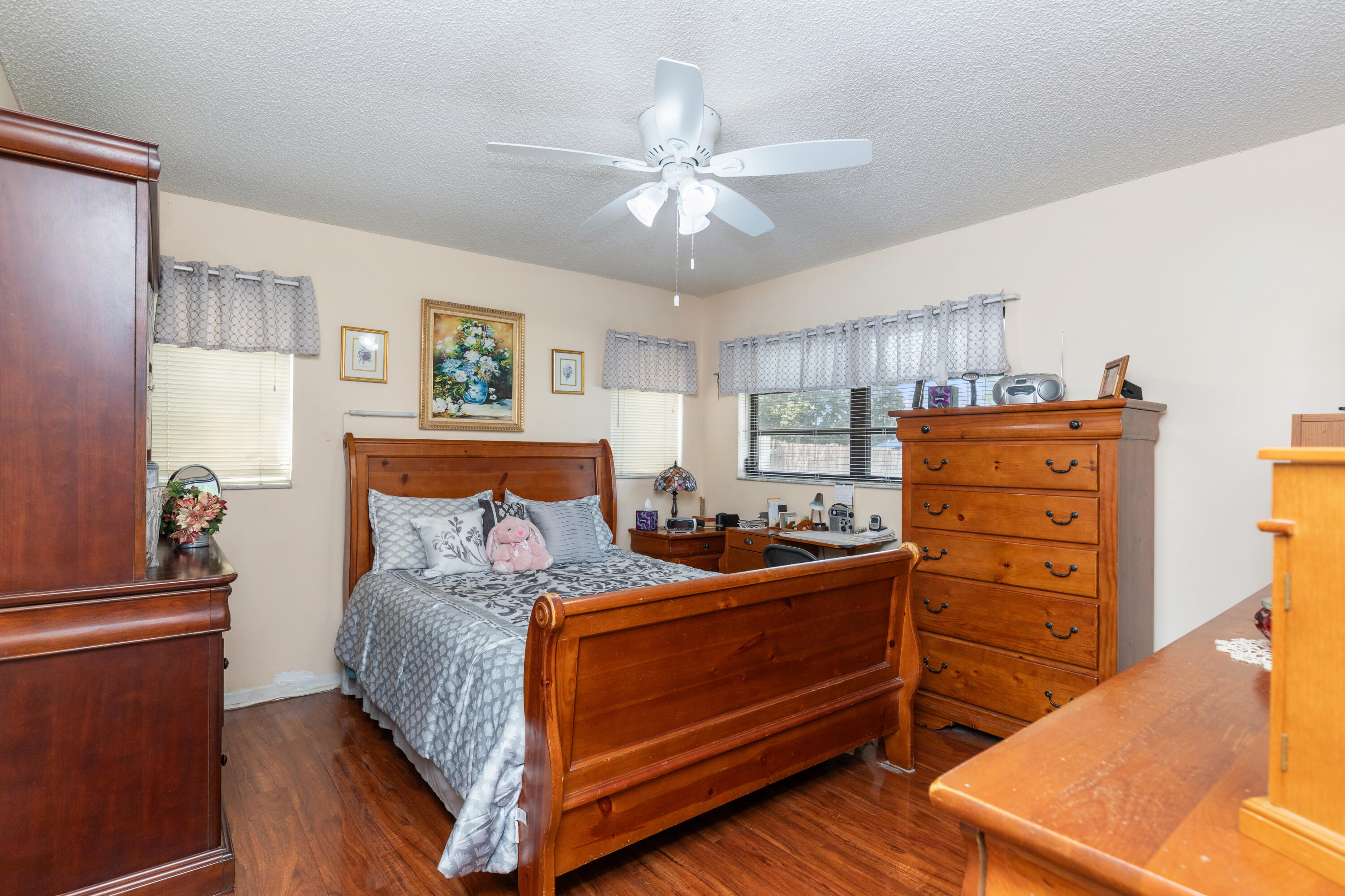 406 Southwest 96th Court, Unit 2 Miami, FL 33174 - Photo 31 of 38 a bedroom with a bed and furniture