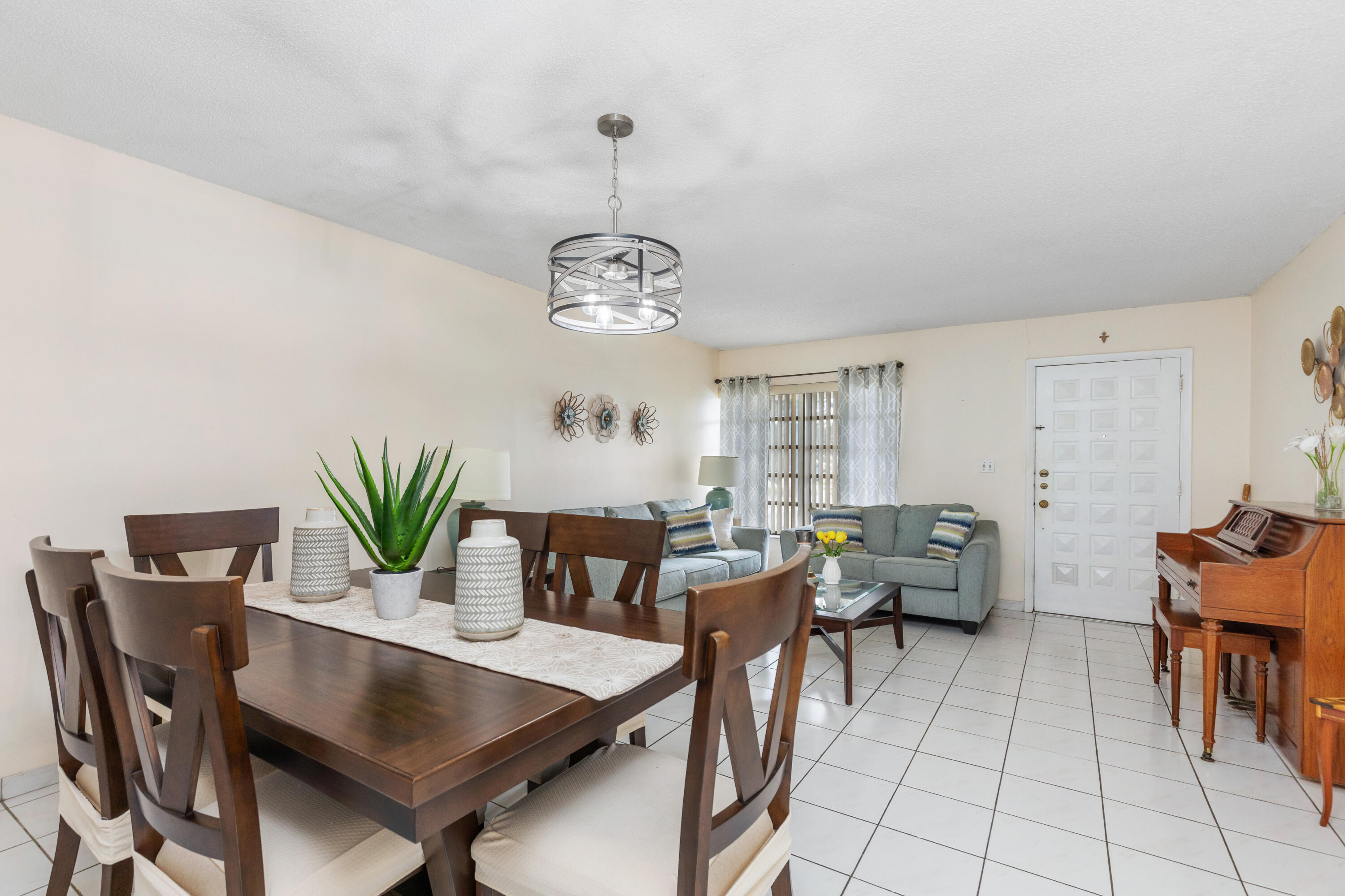 406 Southwest 96th Court, Unit 2 Miami, FL 33174 - Photo 6 of 38 a very nice looking dining room with a table and chairs