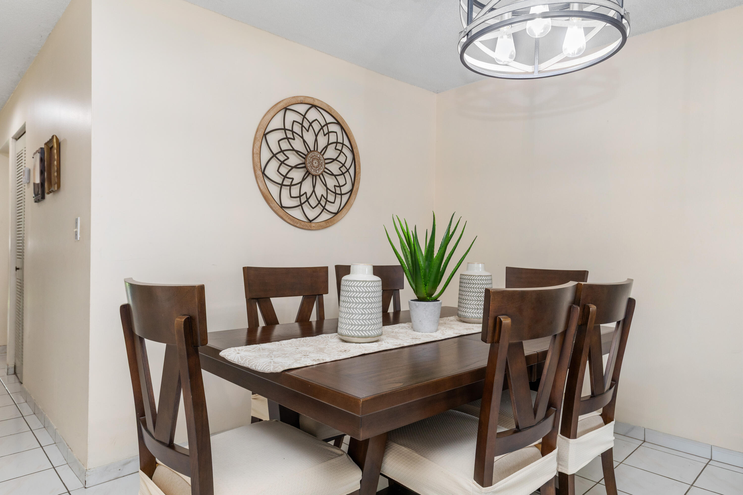 406 Southwest 96th Court, Unit 2 Miami, FL 33174 - Photo 7 of 38 a view of a dining room with furniture