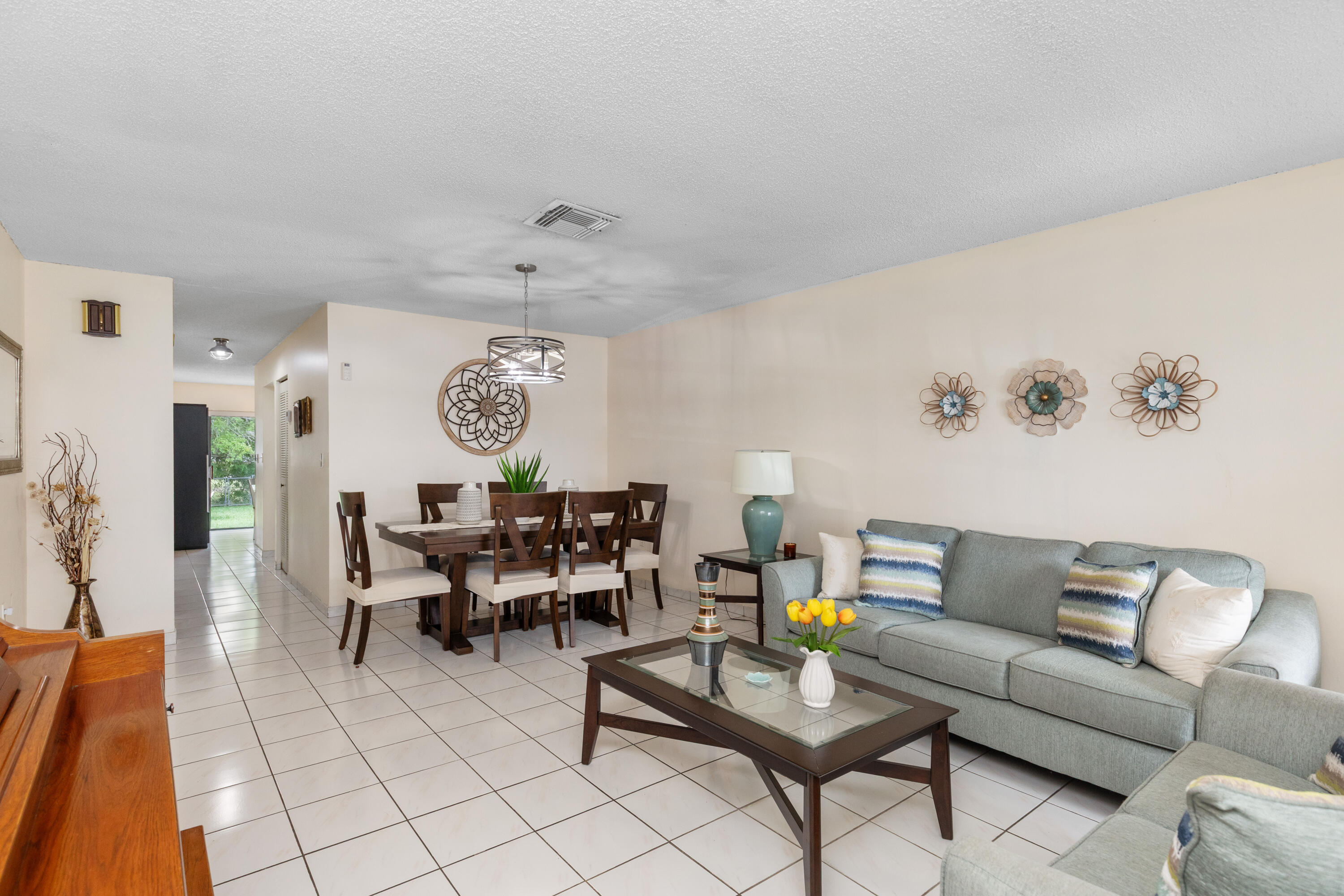 406 Southwest 96th Court, Unit 2 Miami, FL 33174 - Photo 8 of 38 a living room with furniture and wooden floor