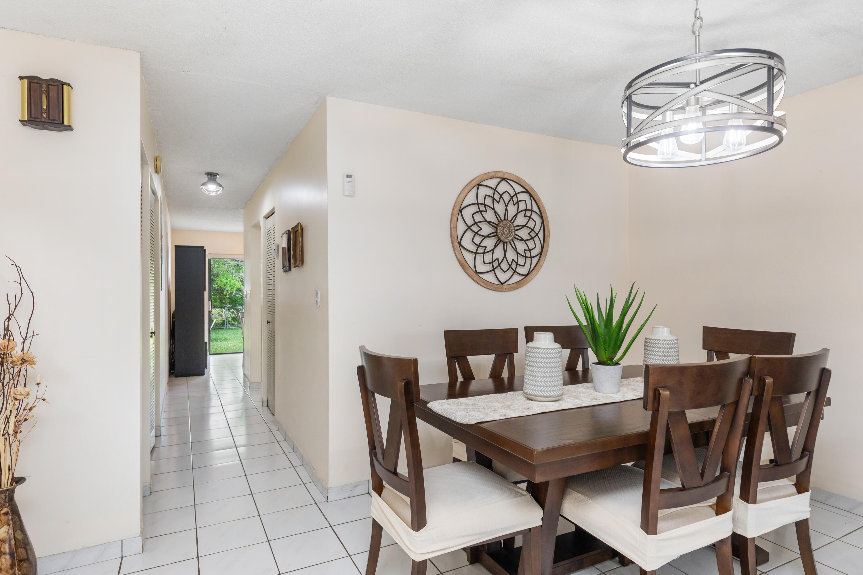 406 Southwest 96th Court, Unit 2 Miami, FL 33174 - Photo 9 of 38 a view of a dining room with furniture