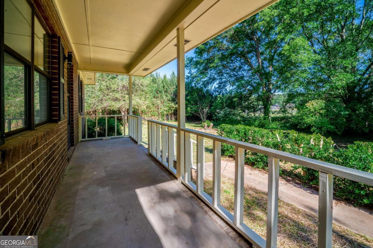 325 Camp Ground Road Griffin, GA 30223 - Photo 3 of 25 a view of a porch