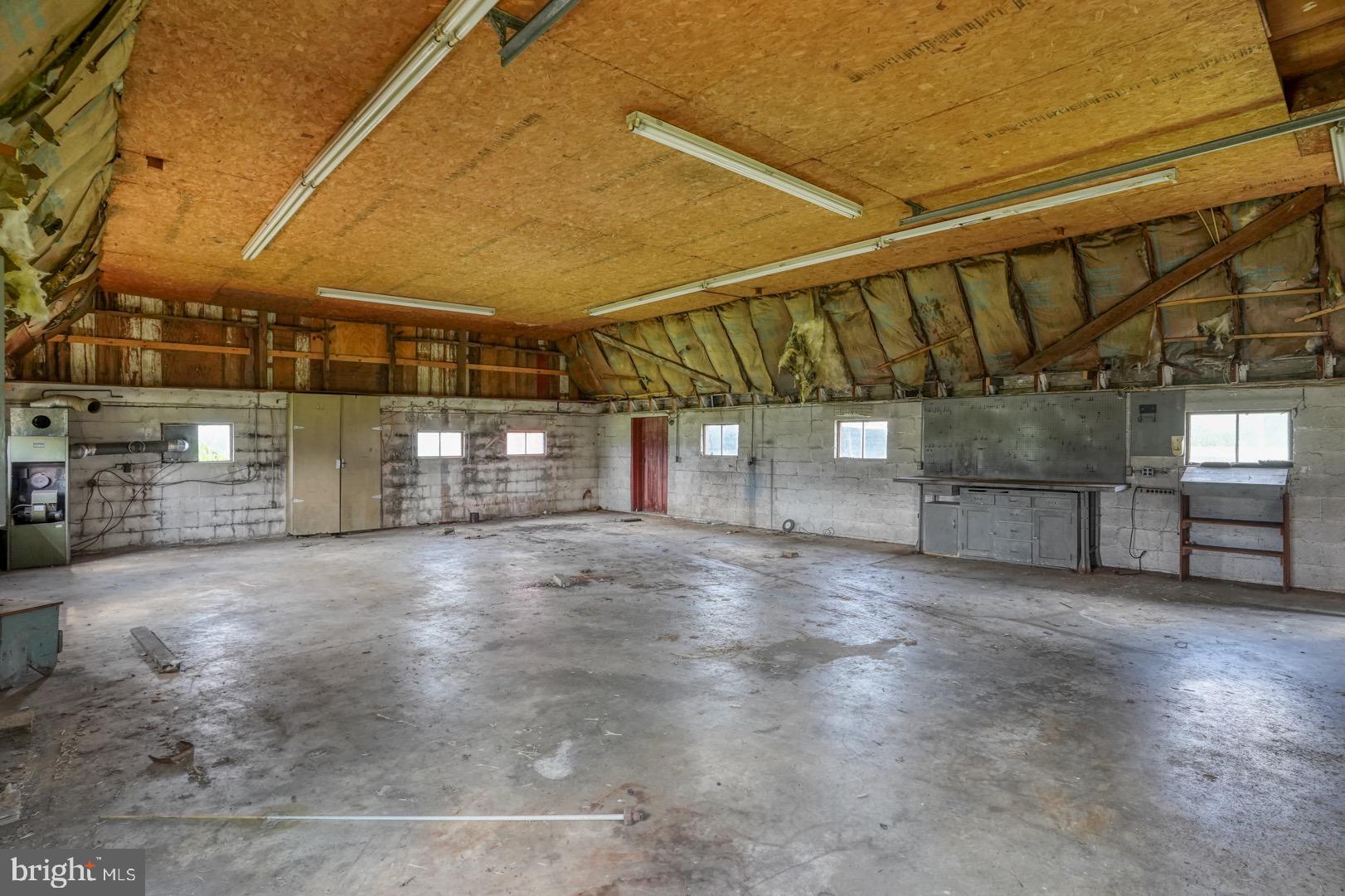 8000 Calhoun Road Milford, DE 19963 - Photo 28 of 38 Interior pole Barn