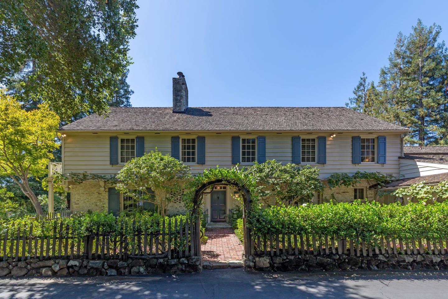 176 Harcross Road Woodside, CA 94061 - Photo 3 of 13 a front view of house with yard and green space