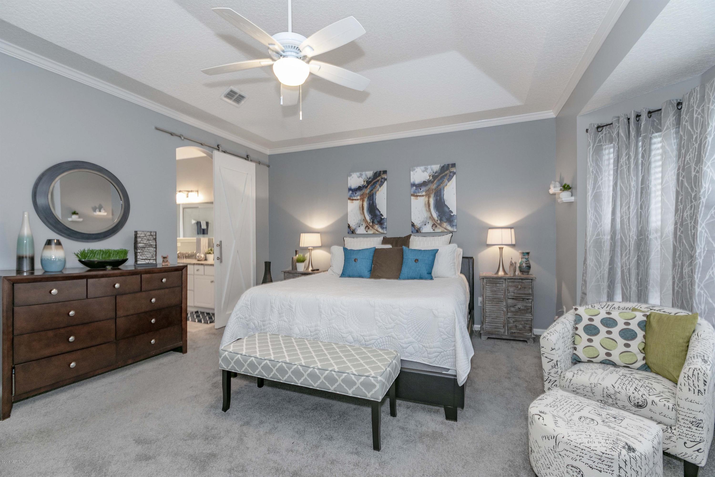 1124 Sandlake Road St. Augustine, FL 32092 - Photo 14 of 24 014_Master Bedroom