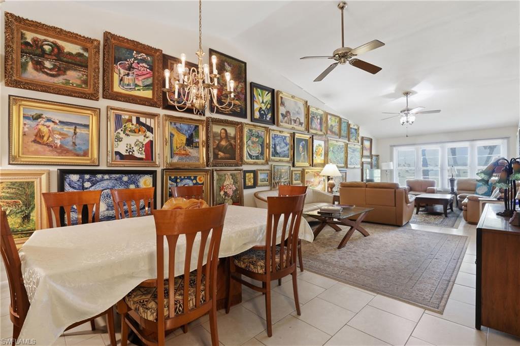 4050 Ice Castle Way, Unit 2812 Naples, FL 34112 - Photo 16 of 49 Spacious open-concept living area featuring high ceilings, recessed lighting, and multiple ceiling fans