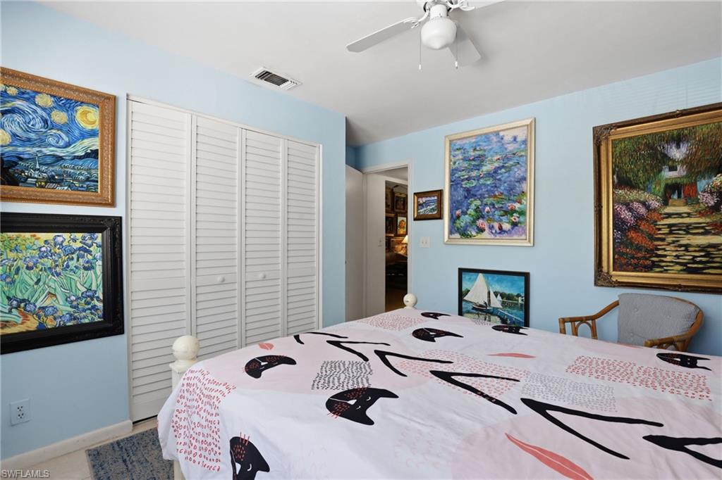 4050 Ice Castle Way, Unit 2812 Naples, FL 34112 - Photo 35 of 49 Light blue wall color with white baseboards