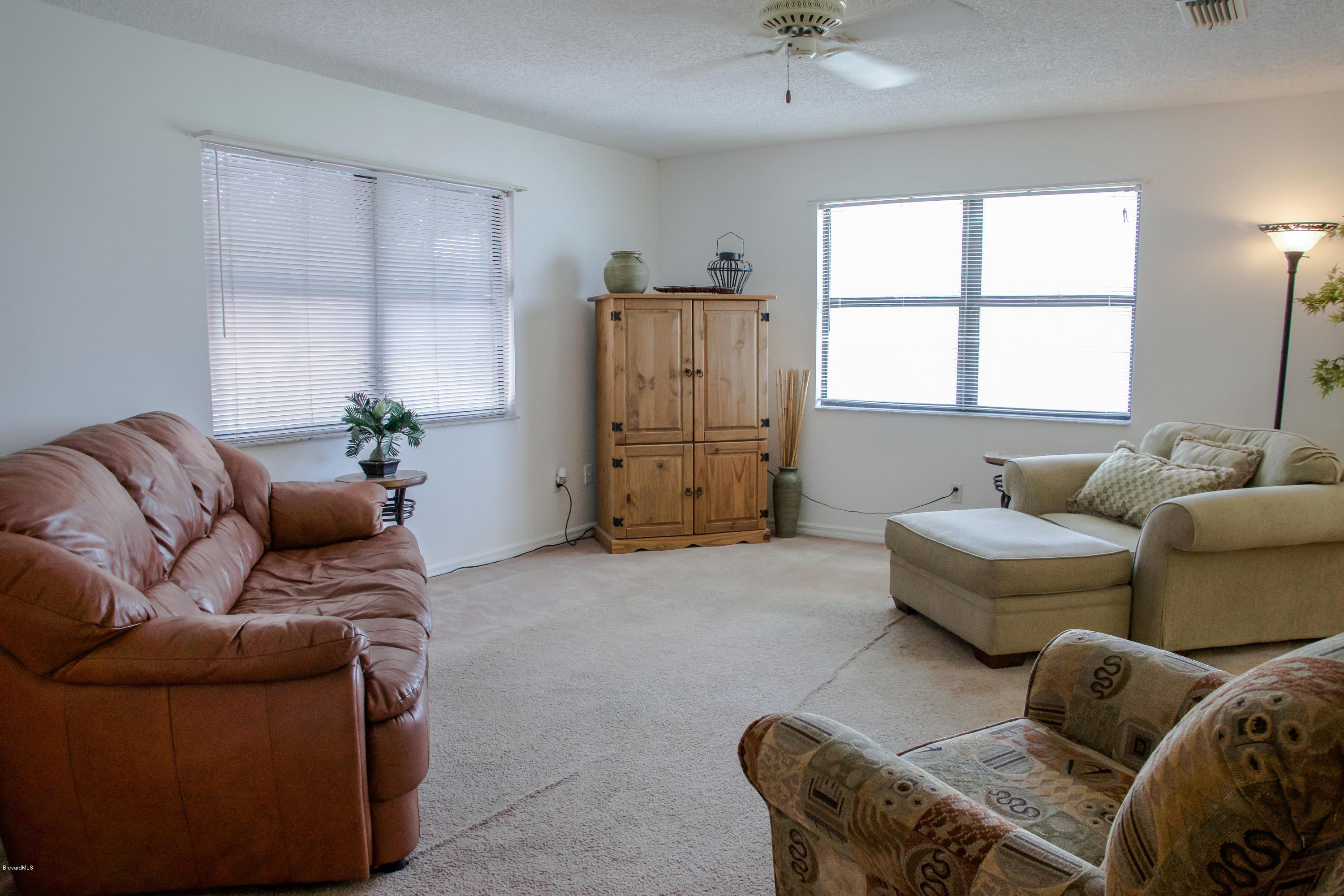 125 East Crisafulli Road Merritt Island, FL 32953 - Photo 10 of 57 living room a