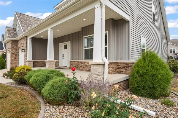 front view of a house with a small yard