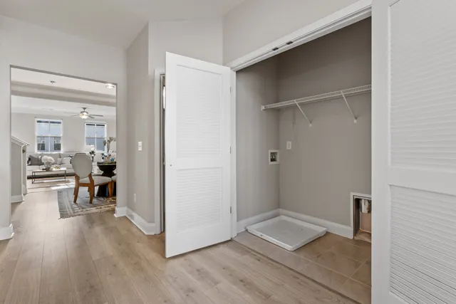 a view of a houses from a balcony