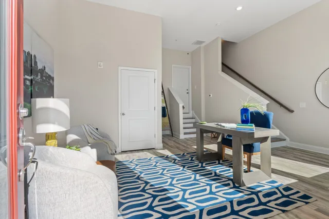 a view of a dining room with furniture window and wooden floor